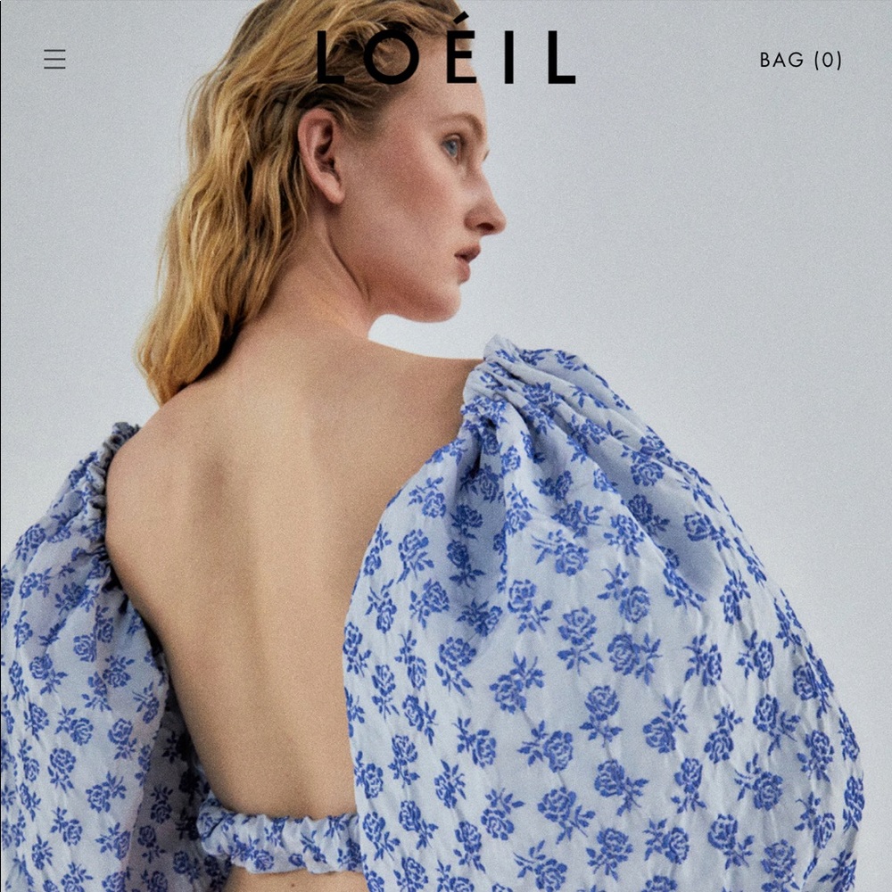 The Loeil Puff Sleeve open back top. Worn once.